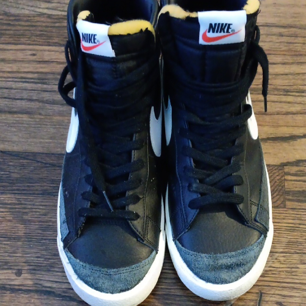 Nike Black and White High-Tops with Gold Accents